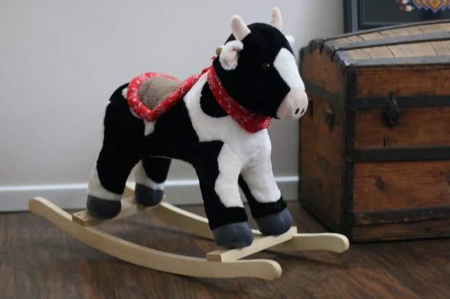  At Christmas time, we visited Mason's family in Delaware and his grandparents Mom-mom and Pop-pop bought this little rocking cow for Ford and it was a perfect addition to his play area.  
